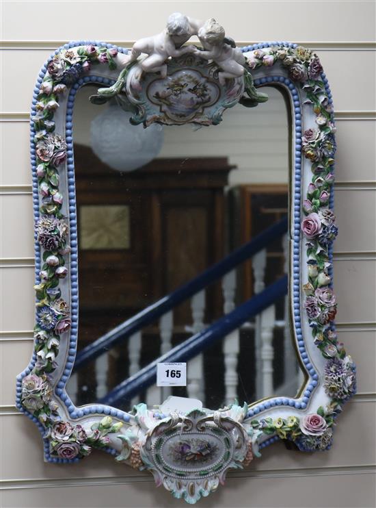 A Dresden flower encrusted wall mirror